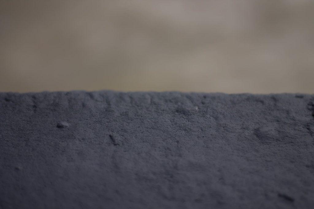 Dark gray powders blurred