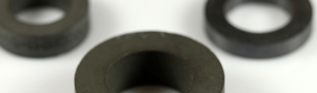 Black ferrite rings, soft magnetic components